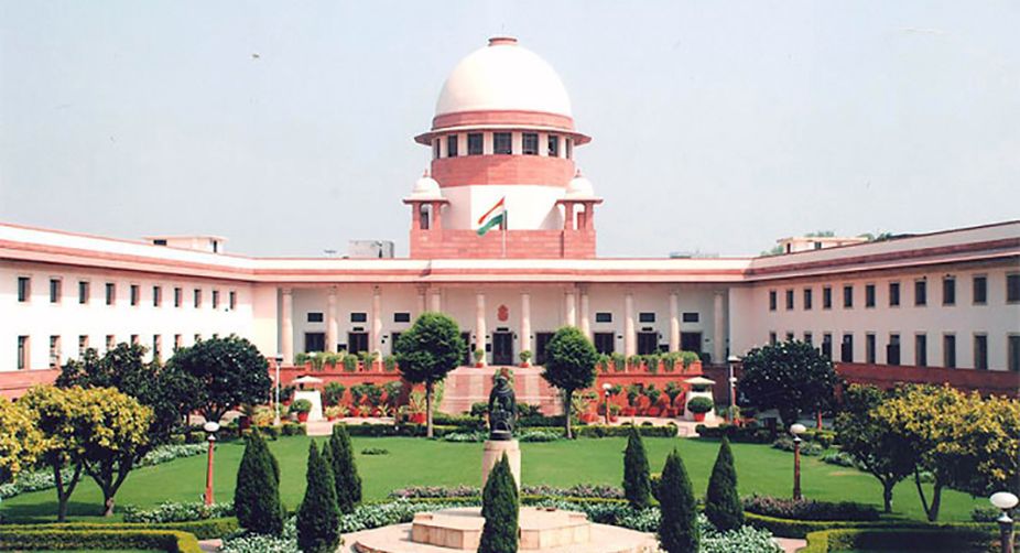 Abusing SC/ST person over phone in public place an offence: Supreme Court