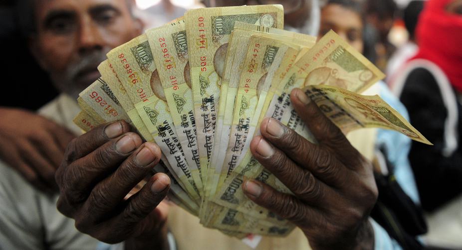 Frantic crowds cross border to unload Indian currency