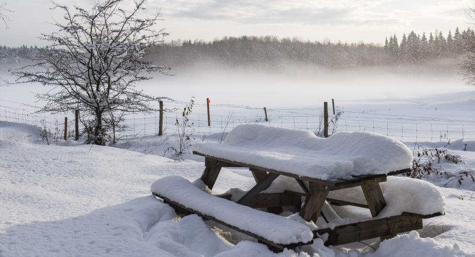 A table covered with snow is pictured at the Igelbaecken nature reserve in Ursvik, Sundbyberg, near Stockholm (Photo: Jonathan Nacktstrand/AFP) img