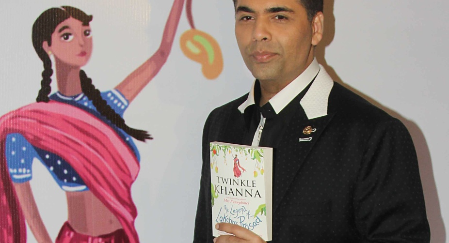 Filmmaker Karan Johar, who is Twinkle's friend, also graced the book launch event (PHOTO: AFP) img