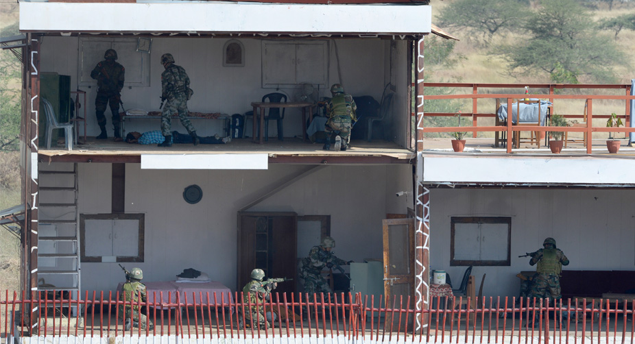 Open House: The Indian and Chinese armies conduct a joint drill, simulating an attack on a terror hideout (Photo: Indranil Mukherjee/AFP) img