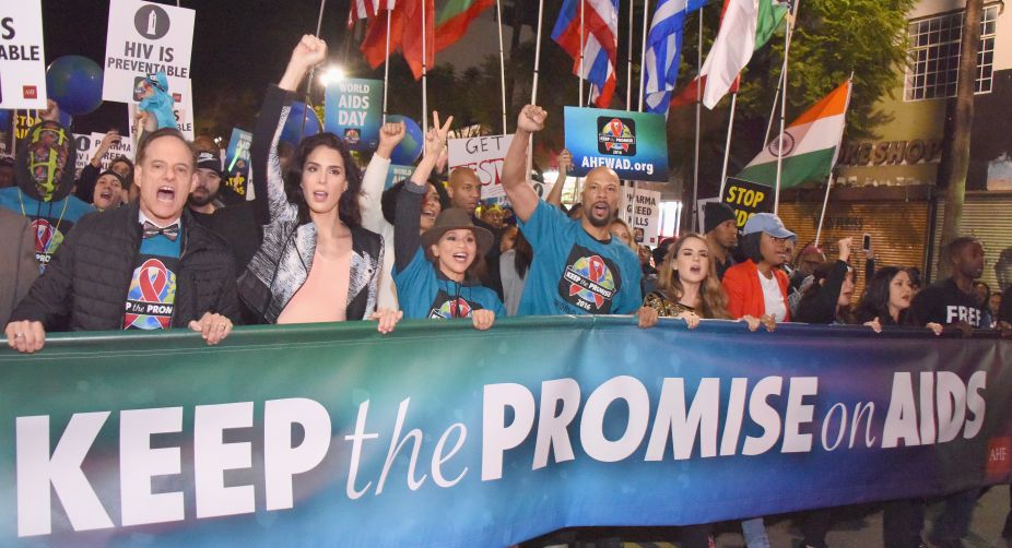 AHF president Michael Weinstein, TV personality Carmen Carrera, actress Rosie Perez, rapper Common and singer-songwriter JoJo take part in AIDS Healthcare Foundations Keep the Promise March in Hollywood, CA (Photo: Araya Diaz/Getty Images/AFP) img