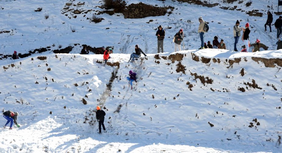 Mild snow near Shimla hills triggers tourist rush