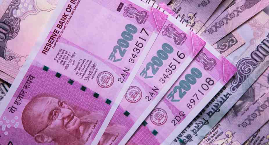 Rupee falls 4 paise against US Dollar