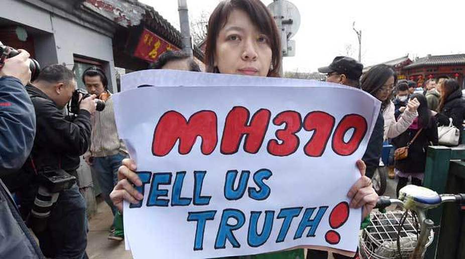 Australia defends end of MH370 hunt, investigation continues