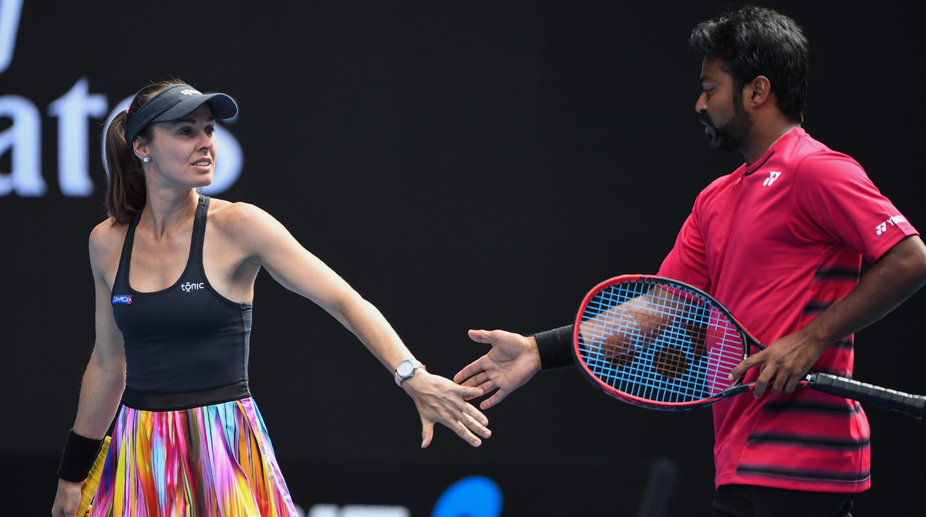 Australian Open: Paes-Hingis march into quarters