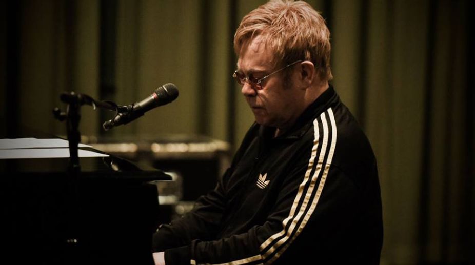 Elton John recovering after hospitalization