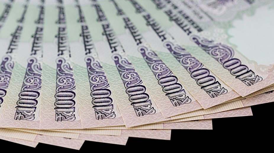 Rupee softens 11 paise against US Dollar