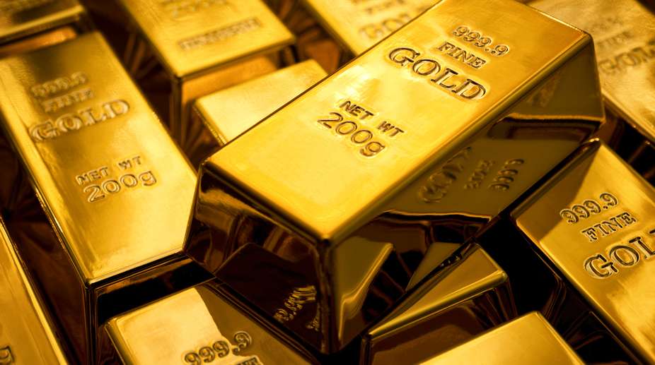 Gold hits 4-month high, climbs Rs.325 on firm global cues