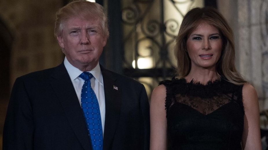 VIDEO | Melania ‘swats’ it away again, but Donald Trump finally gets to hold her hand