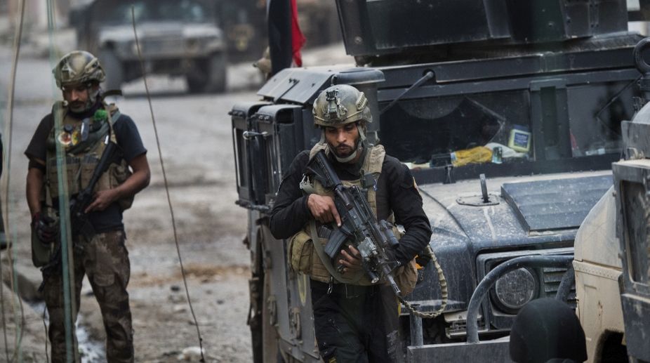 Iraqi troops advance on western Mosul as Mattis holds talks