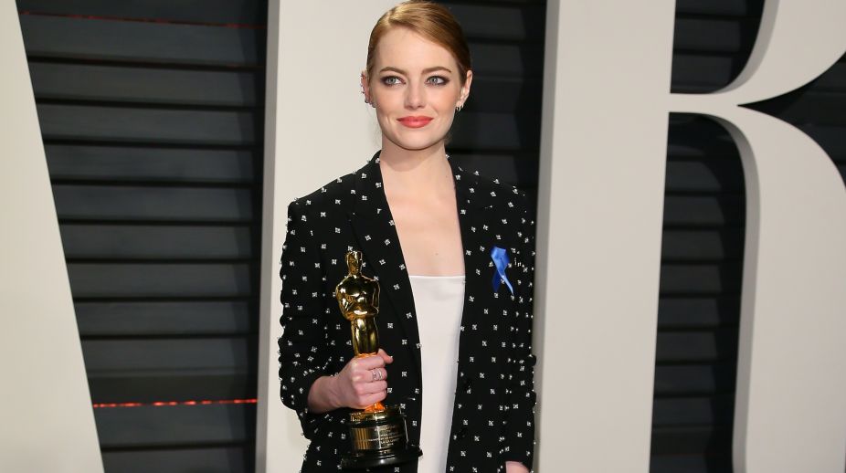 Emma Stone says her male co-stars take pay cuts for her