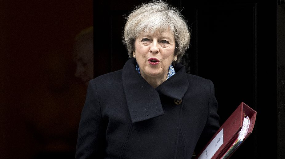 Not taking local election triumph for granted: Theresa May