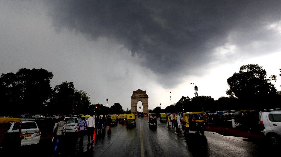 Light rain with gusty winds hit Delhi