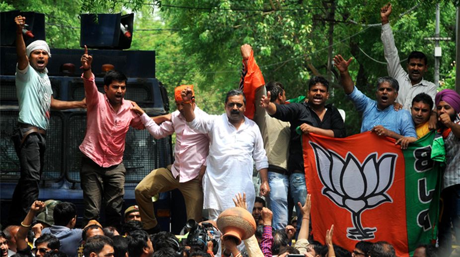 Celebrations break out at UP BJP office, silence at SP office