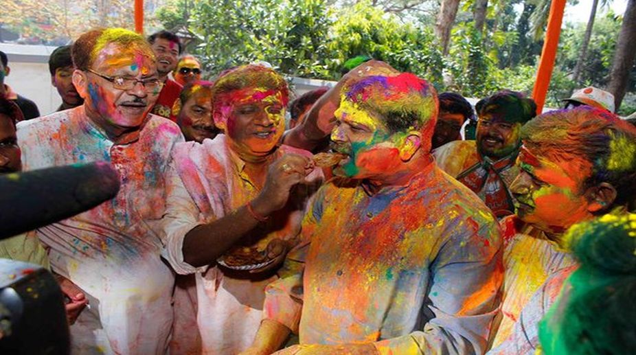 Holi comes a day early for BJP