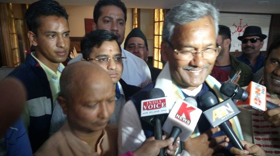 Rawat meets Governor ahead of oath-taking ceremony