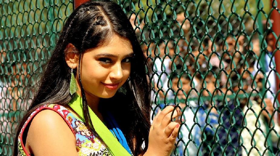 Niti Taylor surprised by her parents