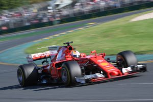 Australian GP: Sebastian Vettel pips Lewis Hamilton to win season opener