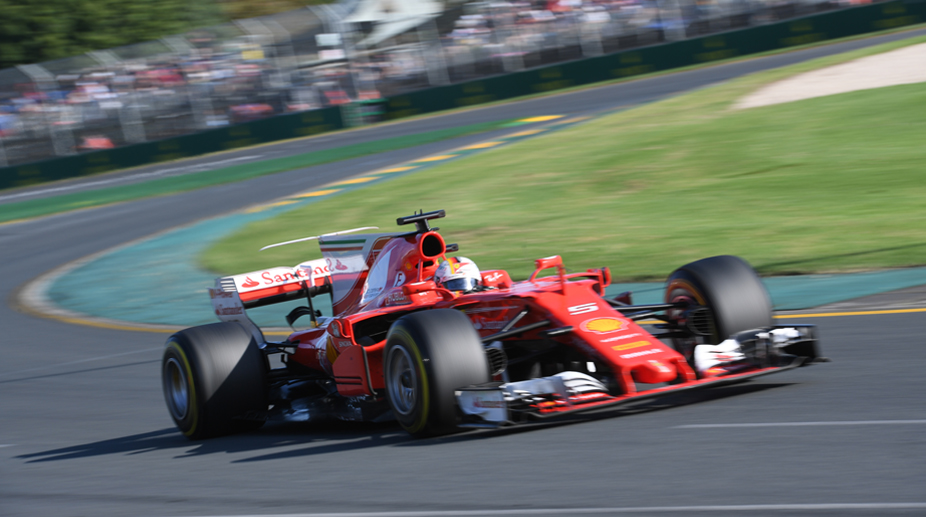 Australian GP: Sebastian Vettel pips Lewis Hamilton to win season opener