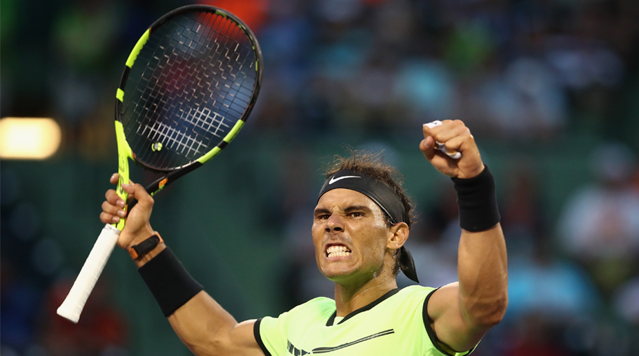 Miami Open: Rafael Nadal recovers from horror start to reach 4th round