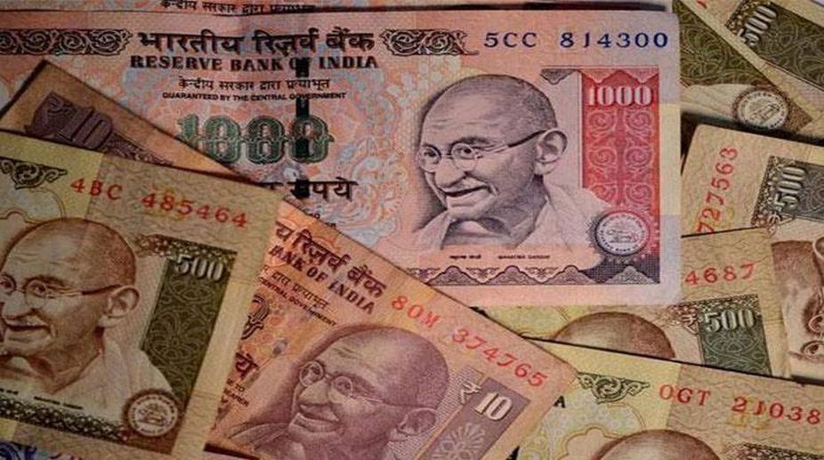 Old notes of Rs.92 lakh face value seized; 2 held