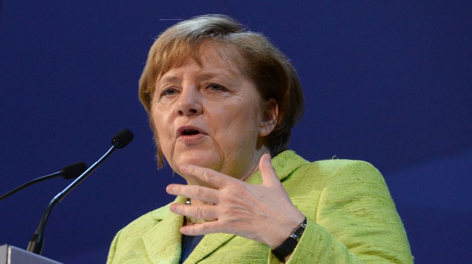 Angela Merkel makes rare Russia visit as Putin backs warmer ties