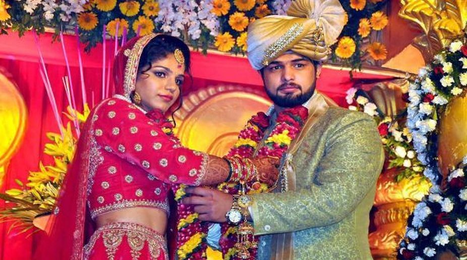 Olympic medallist Sakshi Malik ties knot with Satyawart Kadian