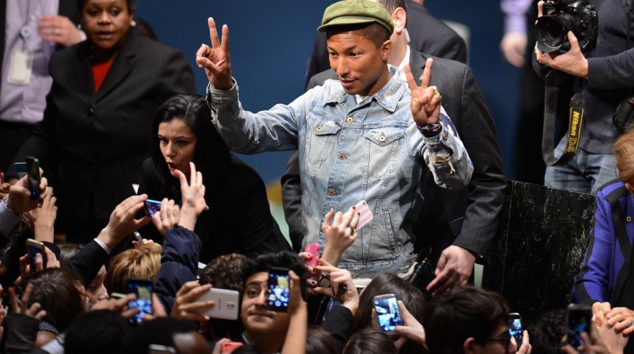 Pharrell working on new music with Grande and Timberlake