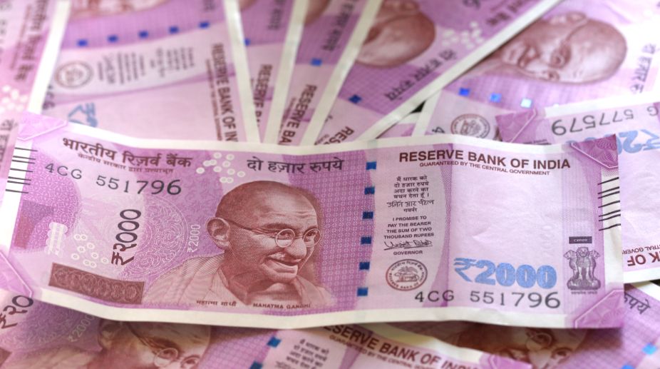 8 held with Rs.31.79 lakh unaccounted cash in new notes