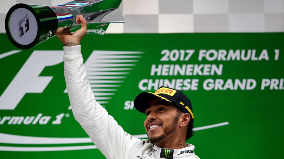 Mercedes’ Lewis Hamilton edges Sebastian Vettel to win Chinese GP