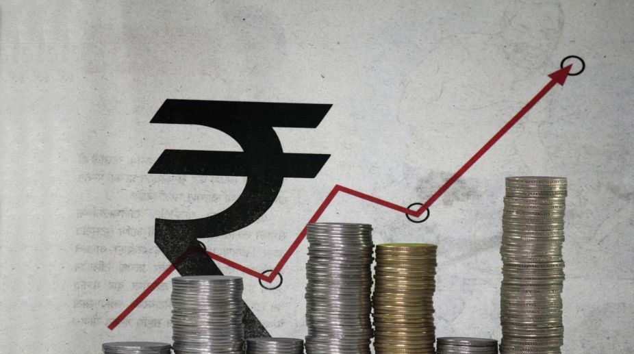 Rupee gains 12 paise against US Dollar