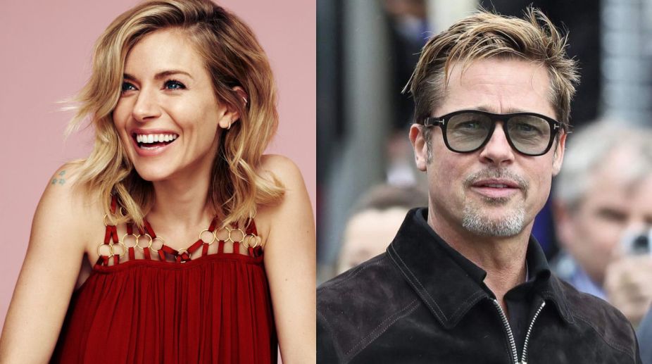 Sienna Miller denies flirting with Brad Pitt