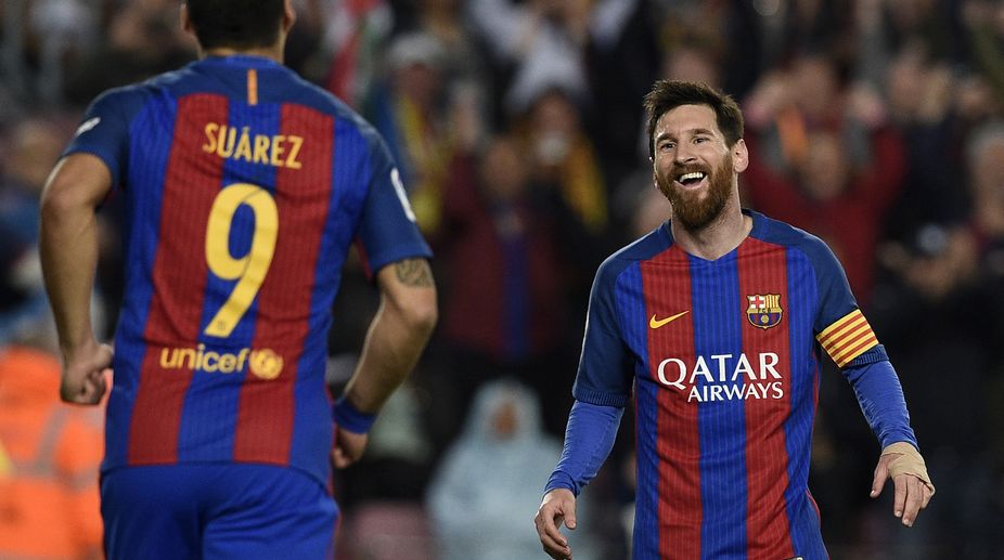 Lionel Messi strikes a double to keep Barcelona alive for La Liga title