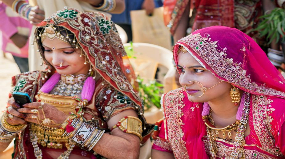 MP government to gift smartphone to brides under its scheme