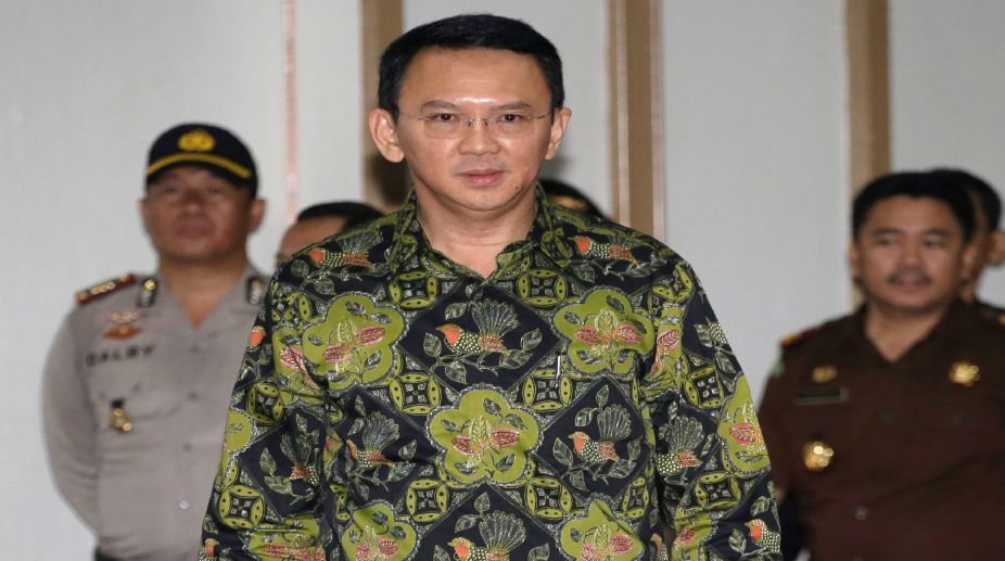 After poll defeat, Jakarta’s Christian governor may escape jail