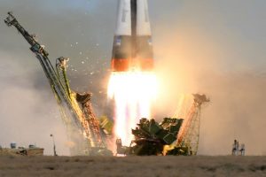 Soyuz capsule with 3 astronauts blasts off for space station