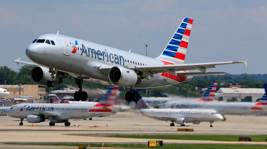 American Airlines attendant suspended for hitting passenger