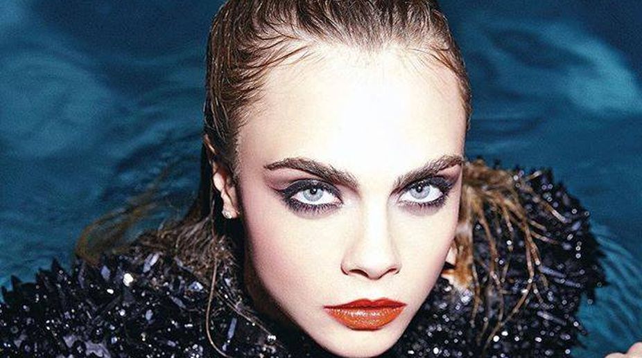 Cara Delevingne sports bald look on ‘Life in a Year’ set