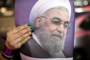Hassan Rouhani looks to beat hard-liner as Iran prepares to vote
