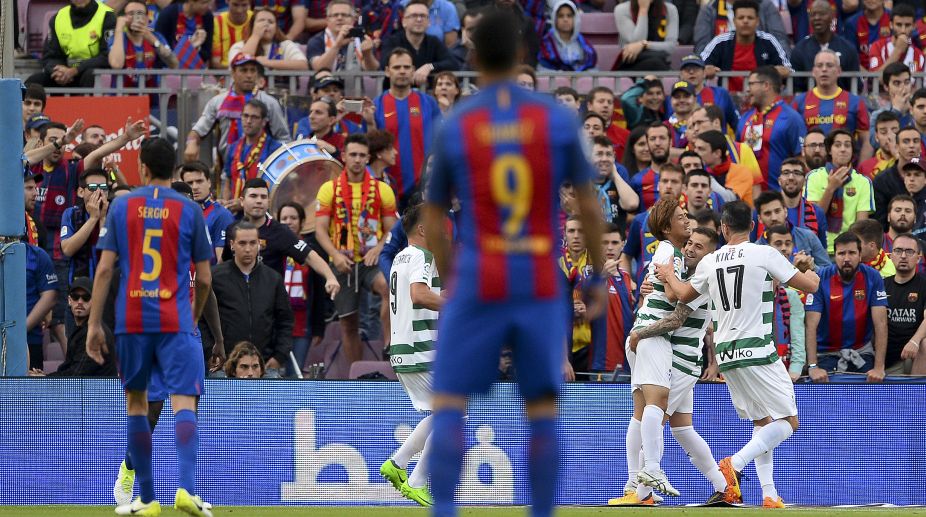 Barcelona battles back to 4-2 win over Eibar