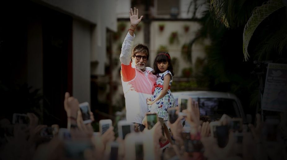 ‘Reluctant’ Aaradhya greets Sunday well-wishers with Big B