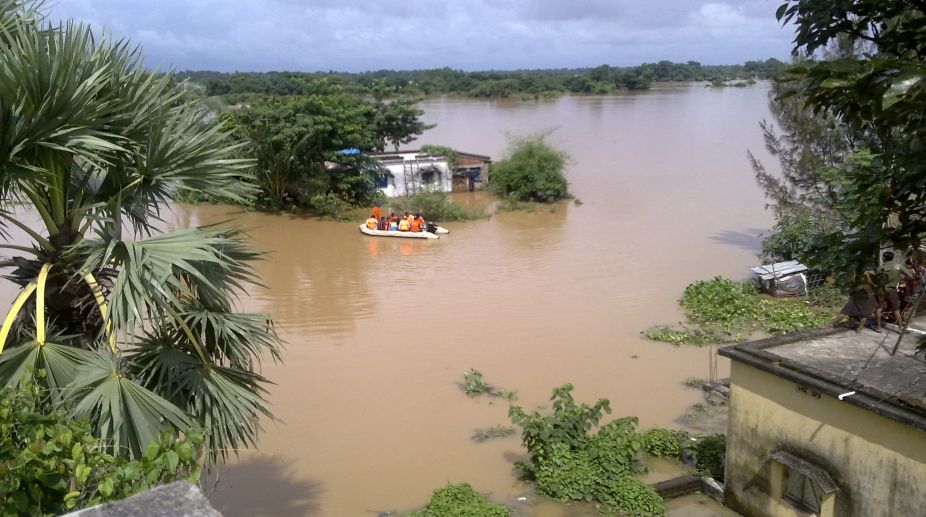 13,000 affected as flood, landslides hit Assam