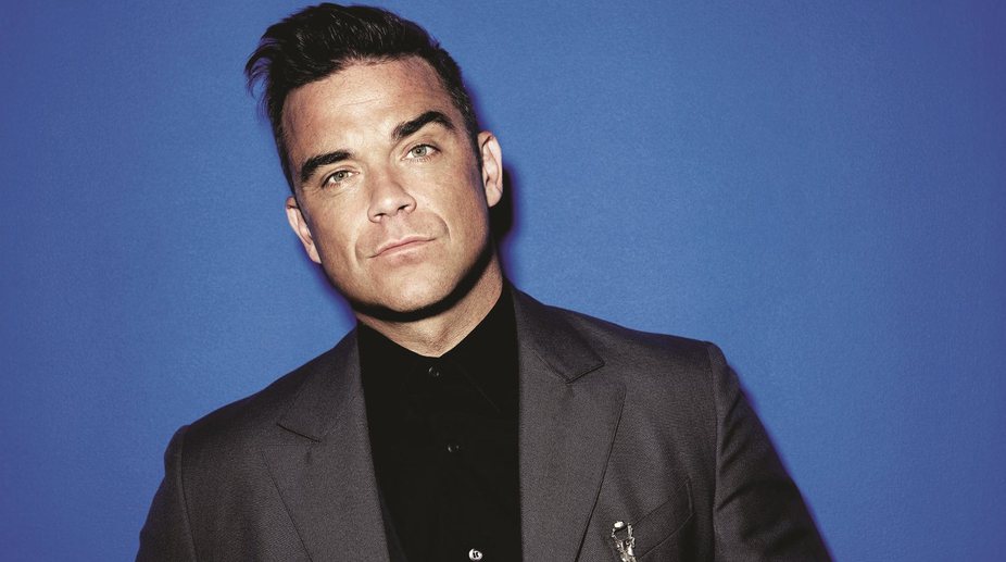 Robbie Williams cries discussing Manchester terror attack