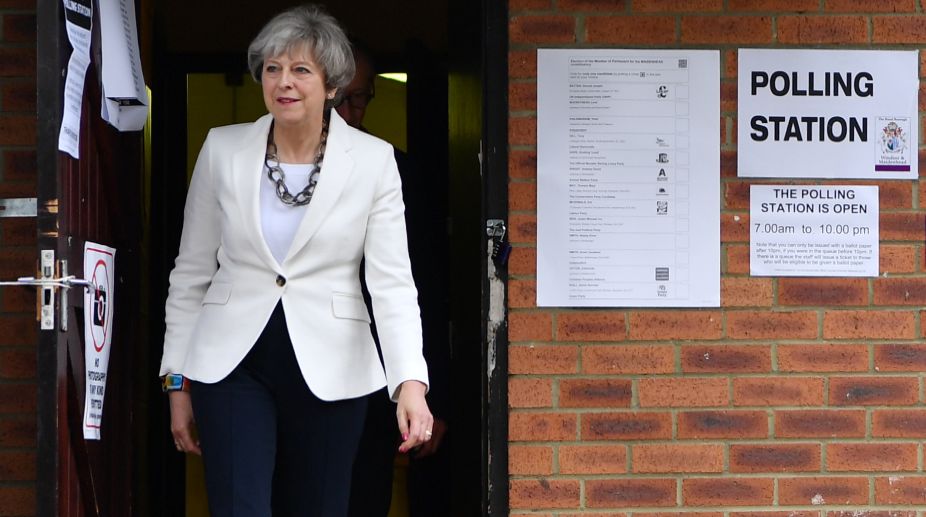 Theresa May’s top two aides quit after election criticism