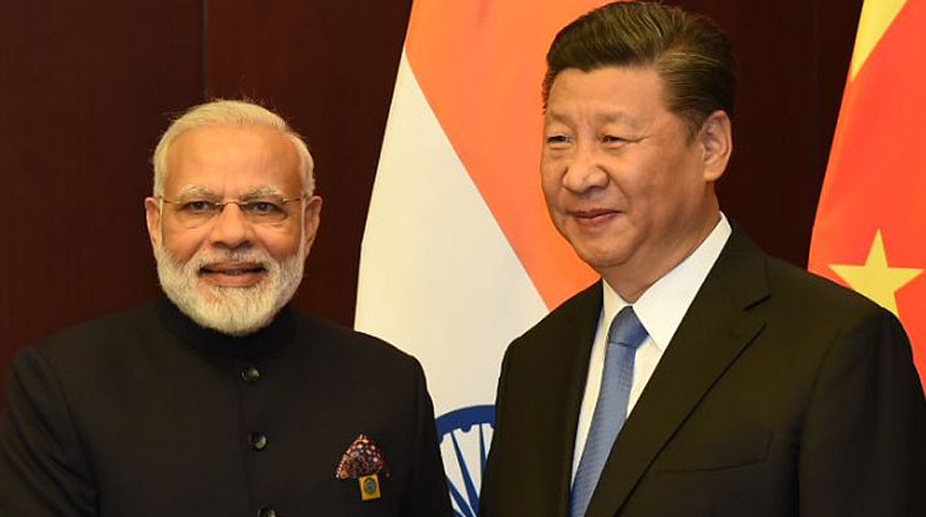 PM Modi meets Xi Jinping in Astana