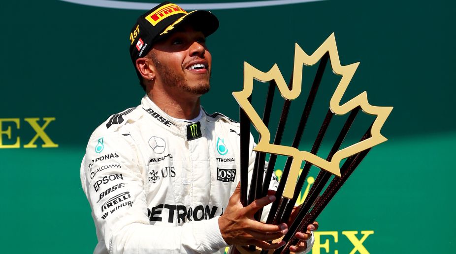 Canadian GP: Lewis Hamilton wins as Mercedes reel off one-two finish