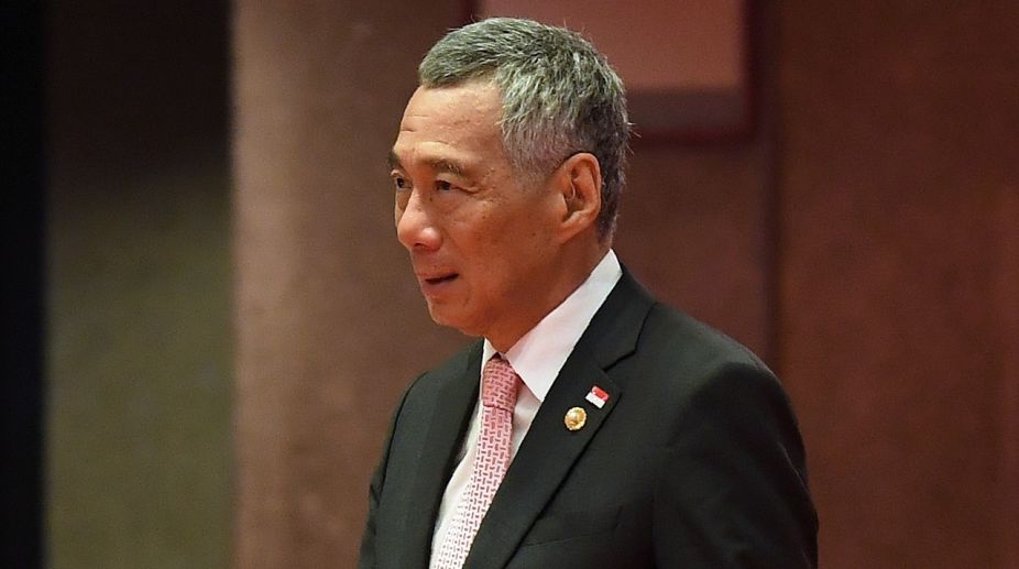 Singapore PM accused of abusing power by siblings