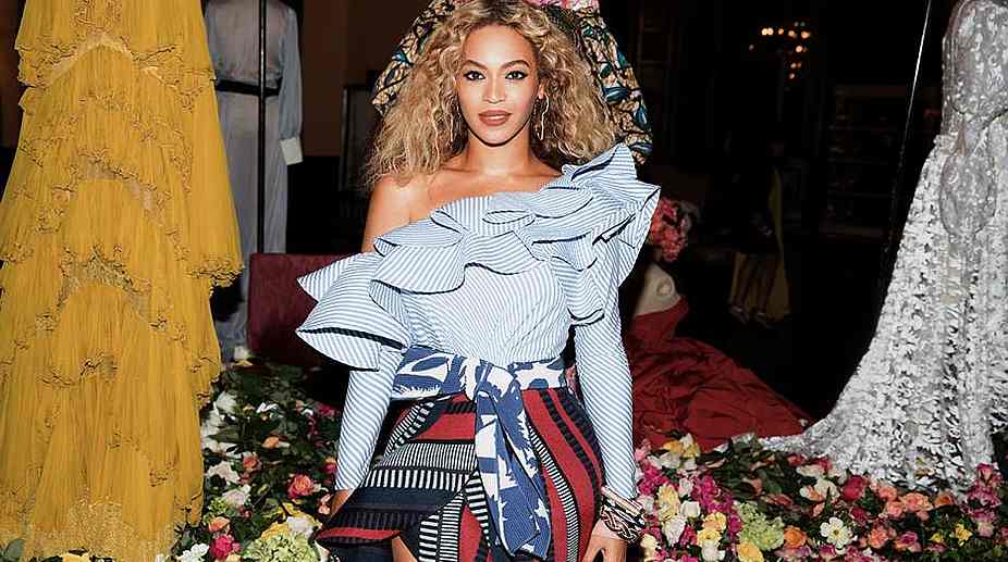 Beyonce Knowles flaunts knee-length braids