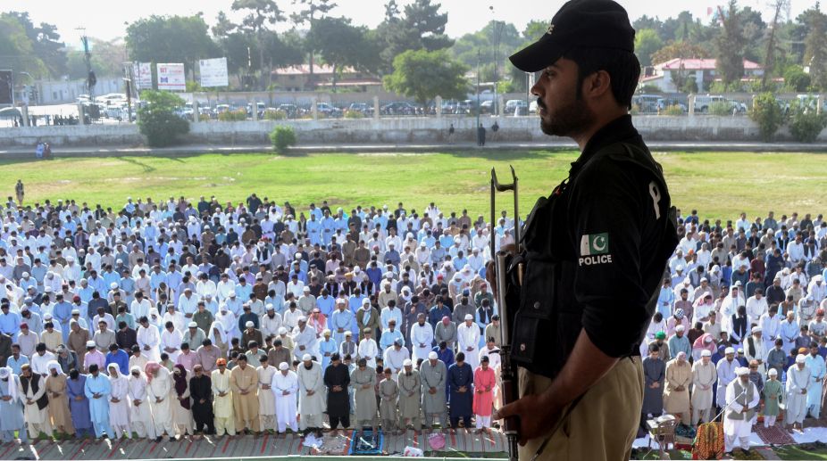 Pakistan marks sombre Eid after tanker blaze, terror attacks